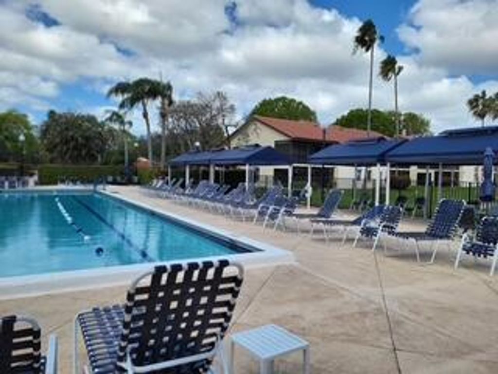 Photo of 10215 N Circle Lake Drive #101, Boynton Beach, FL 33437 (MLS # R11154732)