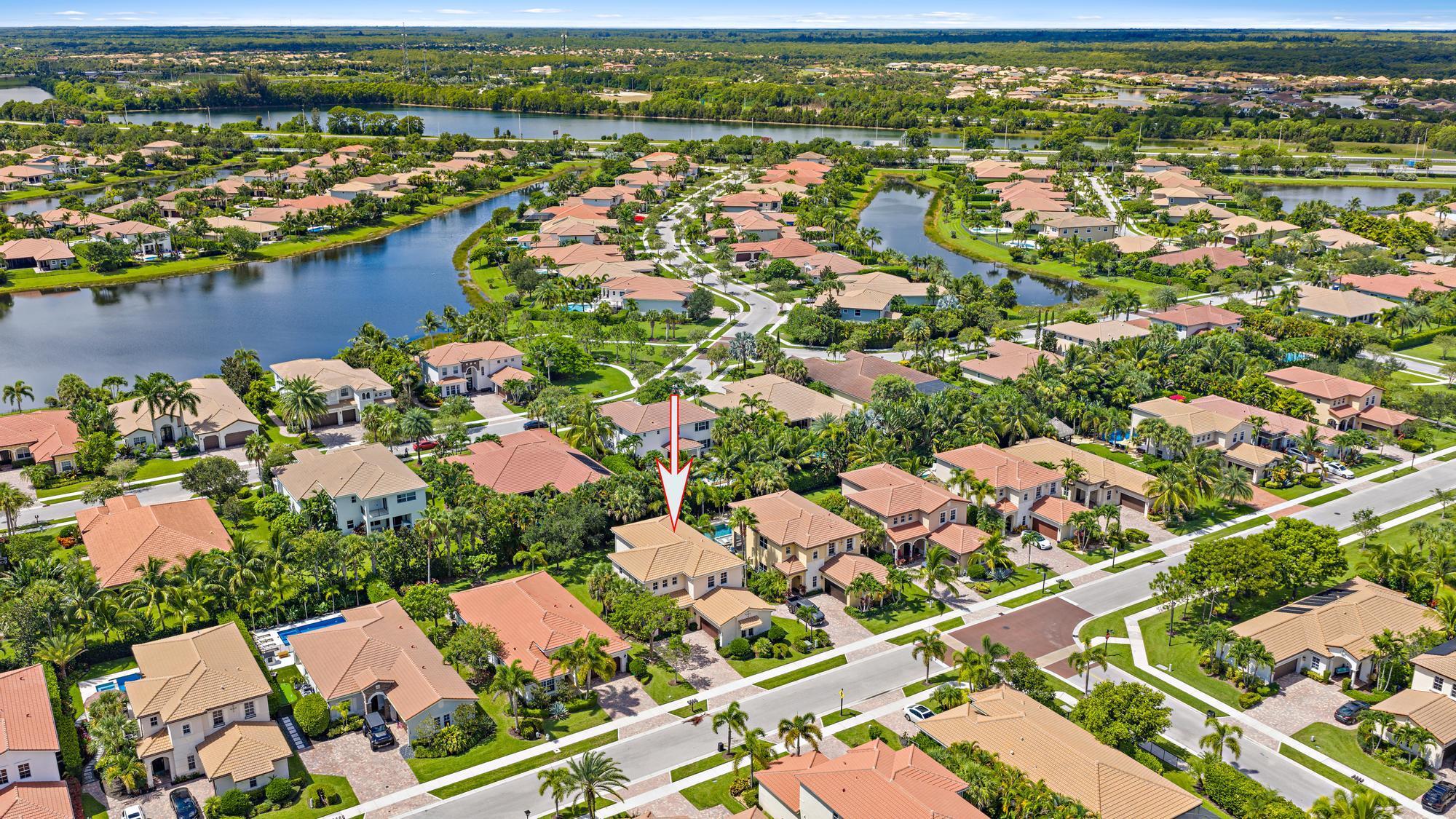 Quietly Located Away From The Highway, Is this Lake lot, CBS, 2 Story, 5 Bedroom, 3 Bathroom, 2 Car Garage Home Boasting Volume Ceilings With Ample Natural Lighting & Includes Neutral Ceramic Tile Floors in Main Living Areas, Carpets Upstairs In The Hallway & in All Bedrooms, 1 Bedroom & Full Bathroom On First Floor, Wood Wrought Iron Staircase, 42' Raised Wood Kitchen Cabinetry, SS Appliances, Granite Countertops,
