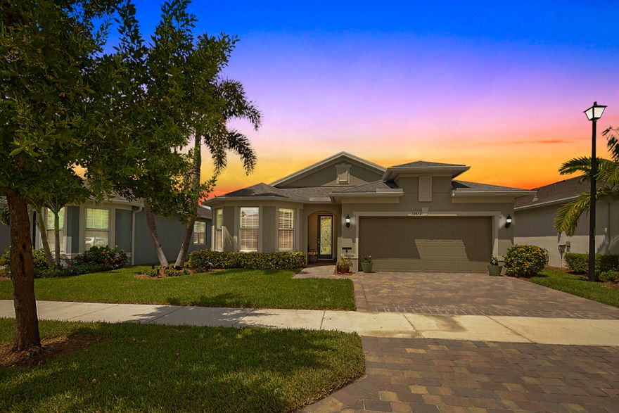 One of the few pool homes available in Del Webb Tradition. Expanded Summerwood model in highly desirable Phase 1 featuring a private saltwater pool with spa jets, heater, and screened enclosure — already completed, with no construction delays or added upgrade costs. Inside, you'll find over 2,000 sq ft of air-conditioned living space with 2 bedrooms, a den, and a bright open layout designed for comfortable everyday living and easy entertaining. What truly separates this home is its impressive scale, offering nearly 4,000 sq ft total — providing substantially more usable space than many competing homes in the community. Enjoy mature landscaping, established surroundings, resort amenities, pickleball, tennis, clubhouses, and close proximity to Tradition Square and Cleveland Clinic.
