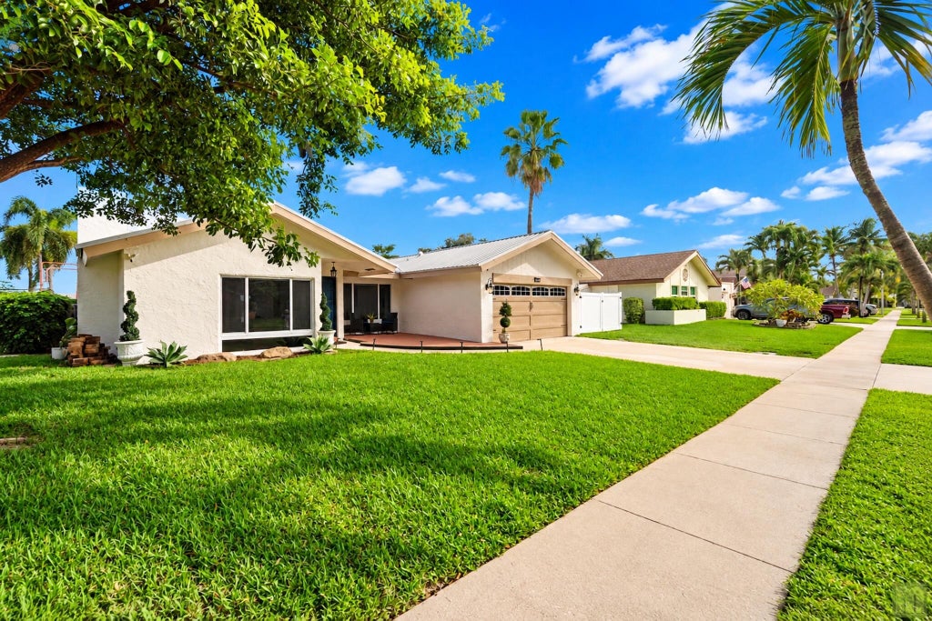 Photo of 4959 NW 6TH Street, Coconut Creek, FL 33063 (MLS # B26091847)