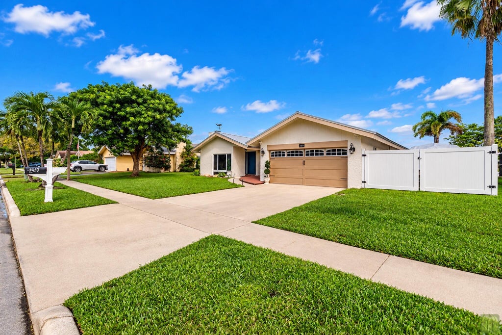 Photo of 4959 NW 6TH Street, Coconut Creek, FL 33063 (MLS # B26091847)