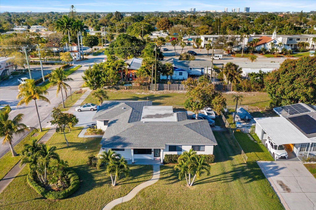 Photo of 651 Foresteria Drive, Lake Park, FL 33403 (MLS # B26070475)