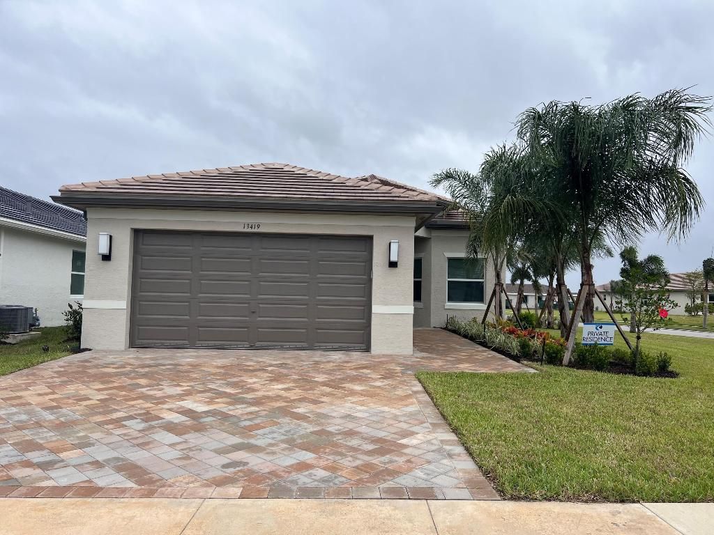 Photo of 13419 SW River Rock Road, Port Saint Lucie, FL 34987 (MLS # R10940350)