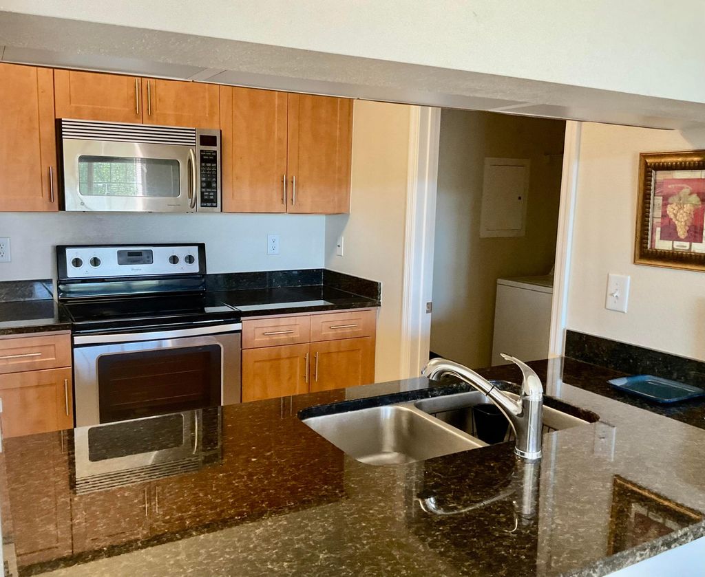 Photo of 6556 Emerald Dunes Drive #303, West Palm Beach, FL 33411 (MLS # B26024592)
