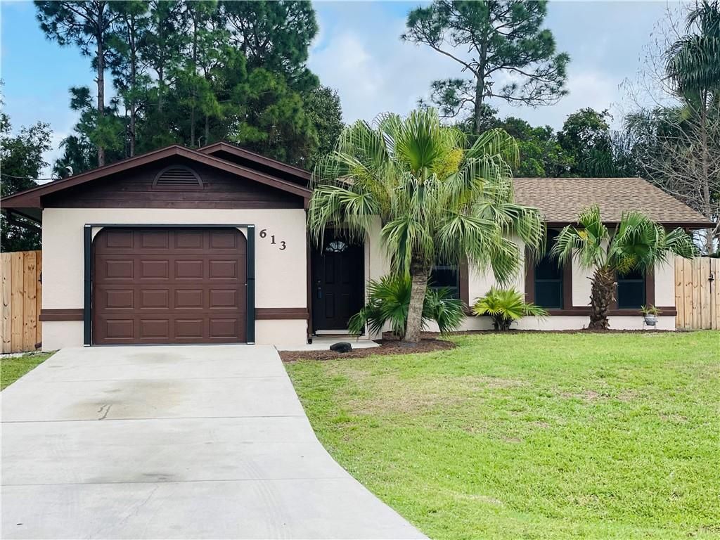 Photo of 613 NW Grenada St, Port Saint Lucie, FL 34983 (MLS # F10322513)