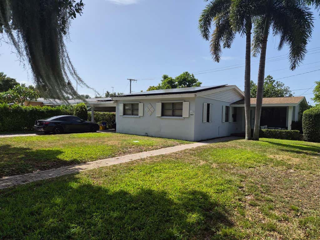 Photo of 1029 OMAR Road, West Palm Beach, FL 33405 (MLS # B26052727)
