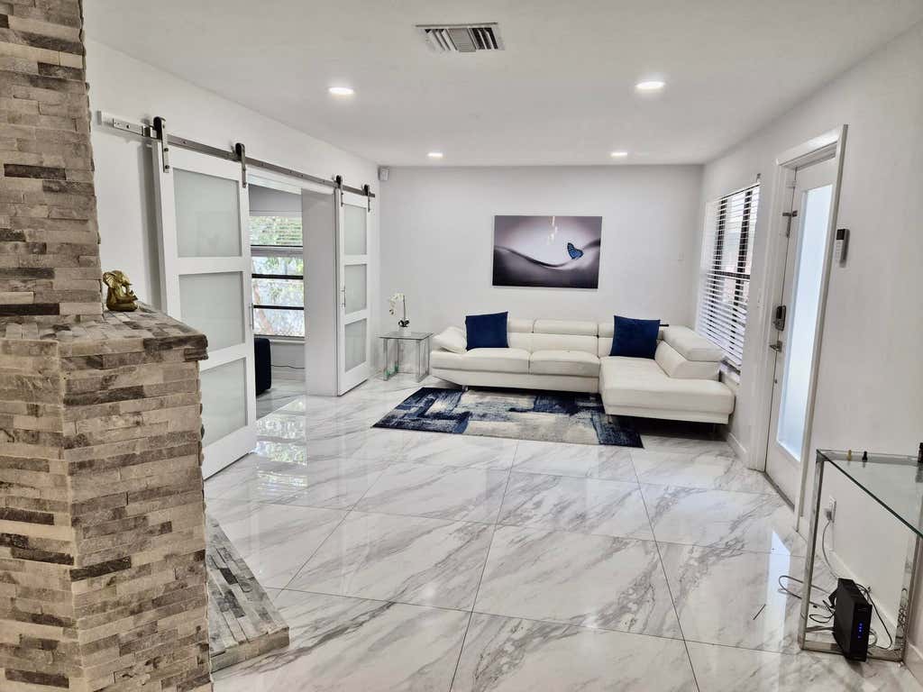 Photo of 1029 OMAR Road, West Palm Beach, FL 33405 (MLS # B26052727)