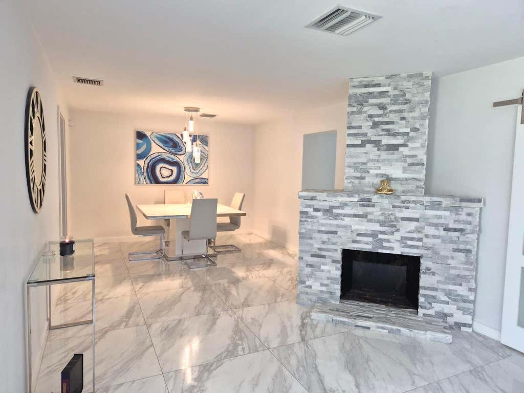 Photo of 1029 OMAR Road, West Palm Beach, FL 33405 (MLS # B26052727)