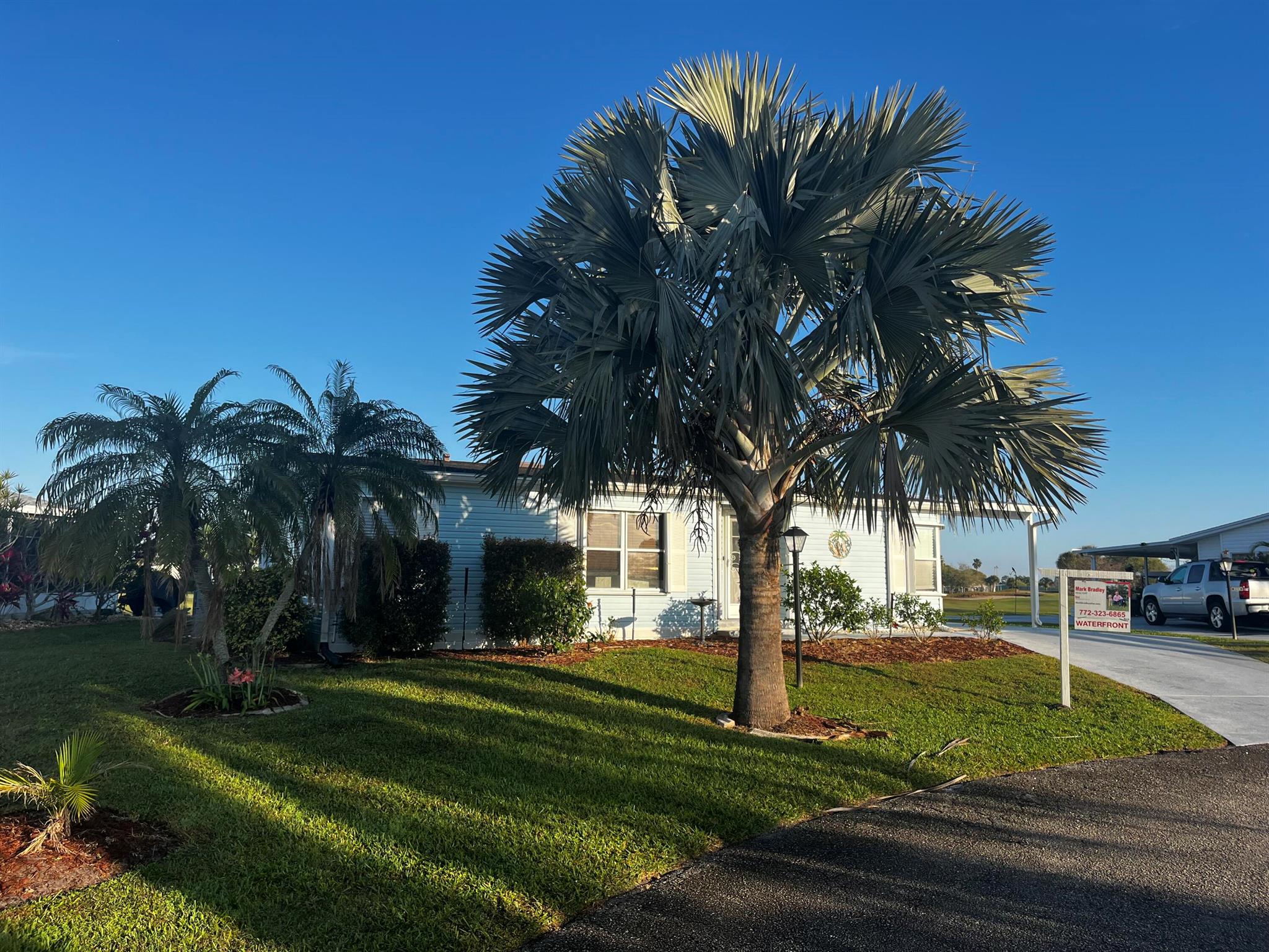 LAND OWNED ON THE WATER AND GOLF VIEW. BEST LOCATION ON A CUL-SAC IN THE PARK. LOT'S OF PARKING . VACANT READY TO MOVE IN. QUICK CLOSE. TWO BED TWO BATH. OPEN FLOOR PLAN. HUGE ENCLOSED LANAI . WASHER AND DRYER INCLUDED ALSO FURNISHED HIGH VELOCITY ACCORIDAN IMPACT SHUTTERS.