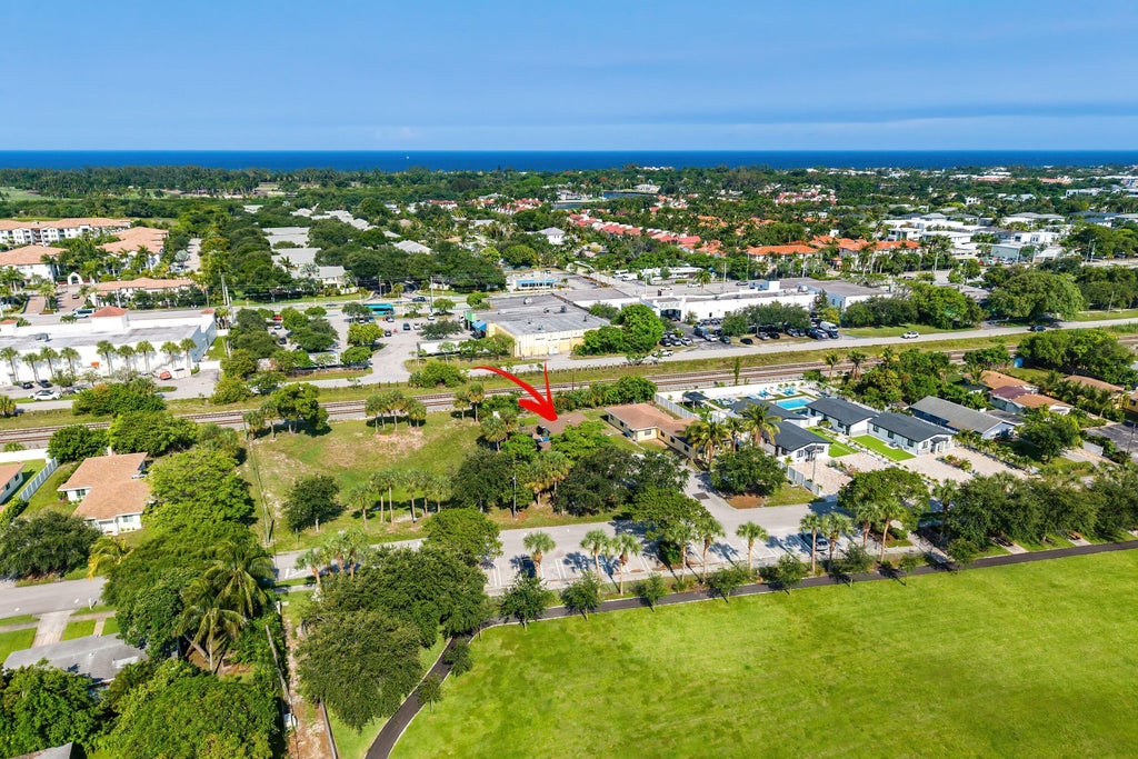 Photo of 1717 NE 3rd Avenue, Delray Beach, FL 33444 (MLS # B26044004)