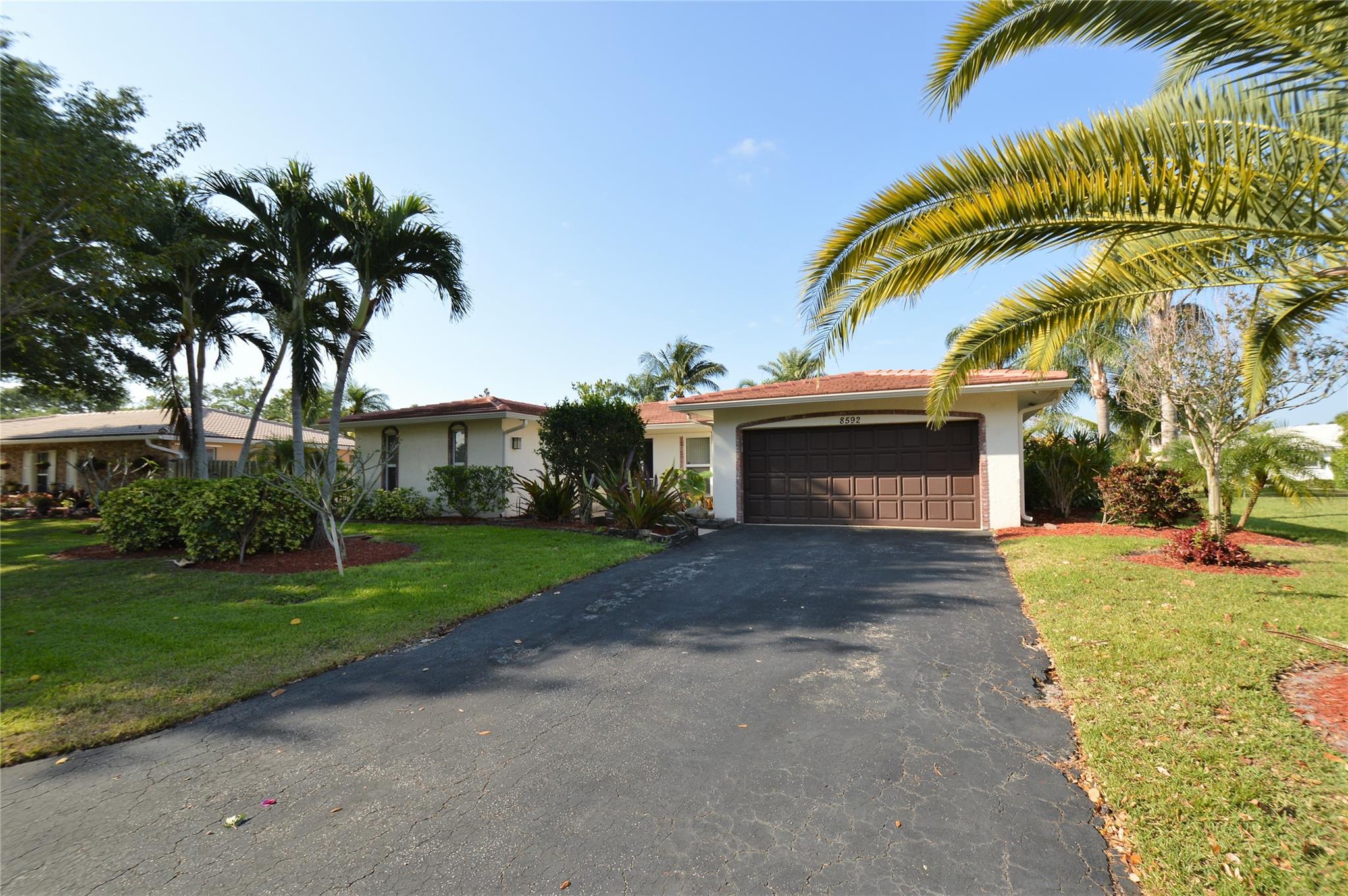 Beautiful 4BR/2BA single-family home on a large waterfront lot with pool, fenced backyard, and 2-car garage. Features include an updated kitchen with newer appliances, ceramic tile in living areas, and wood floors in bedrooms. Enjoy lake views and mature trees from the spacious backyard and covered patio—perfect for relaxing or entertaining. Excellent location near top-rated schools with no HOA and fast approval. Pets welcome with a non-refundable $250 deposit. Tenants must have a 620+ credit score and monthly income of at least 2.5x the rent. First, last, and security deposit required to move in. RENT INCLUDES LAWN SERVICE.