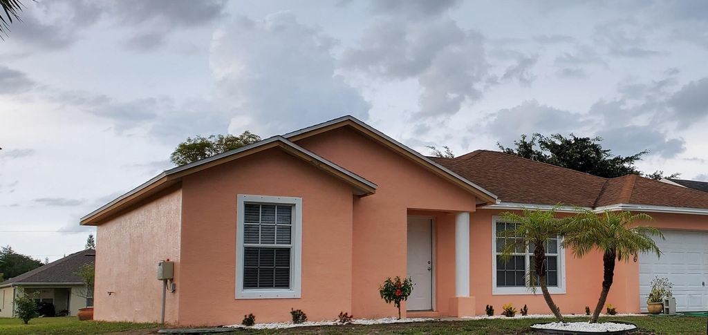 Photo of 2906 SW Boxwood Circle, Port Saint Lucie, FL 34953 (MLS # R10793308)