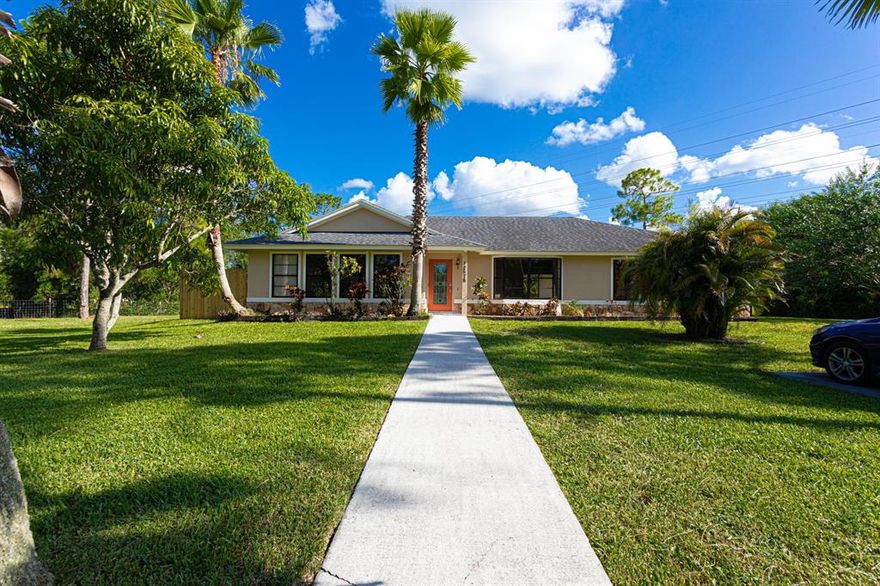 Attention Home Buyers!! Perfect home for 1ST-TIME HOME BUYERS, INVESTORS, or WINTER RESIDENTS. NO HOA and NO CDD!! ,Located in a great and quiet place with 1.53 Acres, this home has been meticulously renovated from Top to Bottom including 4 bedrooms and  2 baths,  this is a home you don't want to miss out on! It could be your primary residence or seasonal and have an extra income on the months you are not using it. Once you step into this home you will find yourself living renovated with new tile flooring throughout the house including patio, and new exterior paint to enjoy the beautiful Florida weather. With the OPEN Concept. find a great place for the chef in the house to create new memories... with the new quartz  countertops, matching backsplash, and steel appliances you will feel great cooking there while everything looks stunning. The home has been painted completely inside with fresh colors. The master suite features a huge walk-in closet leading you to the en-suite bath that is completely updated with new vanity, toilet, and shower. Bedrooms 2 & 3 are a great size that you can fit a queen bed and also have great closet spaces  The 2nd bathroom also has been completely remodeled,  The 4th bedroom is a huge flex room that could be used for many scenarios to bring your in-laws.  Big driveway will let you park your car and toys. Feels like you are walking into new construction. If you are looking for an affordable home in a great location, hurry now to see this property! Don't miss this great opportunity. This home will not last long!! Call today for appointments!