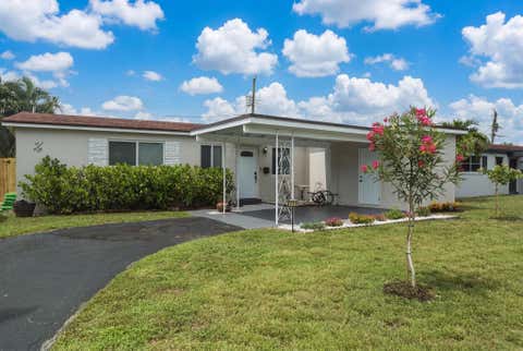 Tiny photo for 250 NE 57th Street, Oakland Park, FL 33334 (MLS # B26049907)