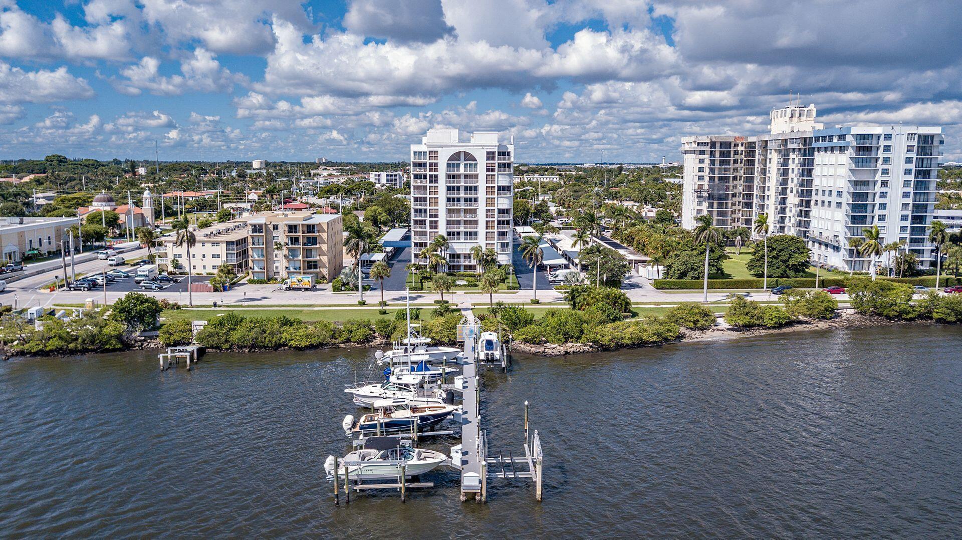 Enjoy Intracoastal and Marina views from this charming 2/2 apartment. Located in highly desirable location convenient to Palm Beach, PBA University, downtown West Palm Beach and I-95 with easy access to shopping and trendy restaurants. Appointed with bleached wooden floors, new hurricane impact windows and sliding doors, custom wood kitchen cabinets and granite counter tops. Come see it and submerge in this coastal sanctuary awaiting just for you. Additional features include, secured entrance, dedicated covered parking space and luxurious pool.