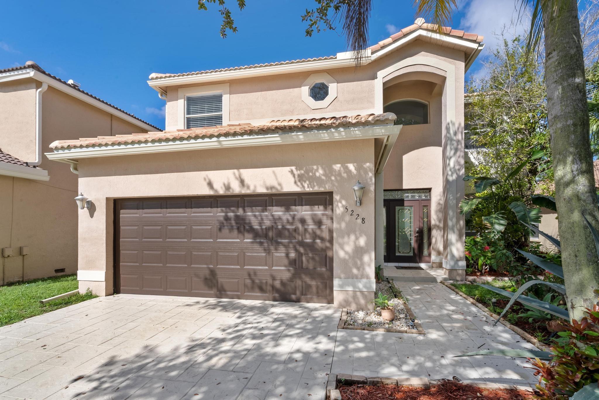 Stunning home with 4bd/2.5ba/2car garage and private pool located in highly desired community of Sanctuary at Kensington. A prime location within the community and walking distance to "A" rated schools. Property features beautifully updated kitchen with custom made appliances, quartz countertops, breakfast Island, updated bathrooms with granite countertops, no popcorn ceiling, plenty of closets and storage, large and very spacious bedrooms, laundry room inside the house, fully fenced yard, freshly painted & ready for a new tenant. The house is located in one of the most desired areas of Coral Springs, right at Coral Ridge exit of Sawgrass Expressway, close to Parkland, "A" rated schools, shopping & entertaining. Minimum 650 credit score required by the association. Fast approval. Must See!