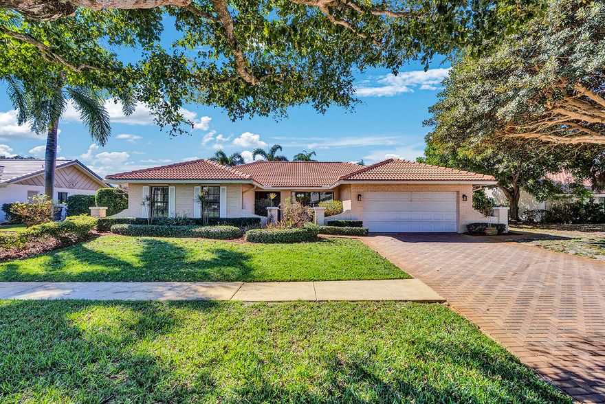 This single home in Indian Springs perfectly blends the serene golf course views with comfortable South Florida living.  The spacious layout features an open floor plan with natural light for everyday living and entertaining.  Offered partially furnished. Tiled throughout, crown molding and security camera. NEW AC in 2025, dual HWH, hurricane protection, electric charger in garage, roof replaced in 2012 and flat roof replaced in 2025. Non-mandatory country club community with optional membership opportunities, Indian Spring offers a beautiful, active lifestyle close to shopping, dining and beaches.