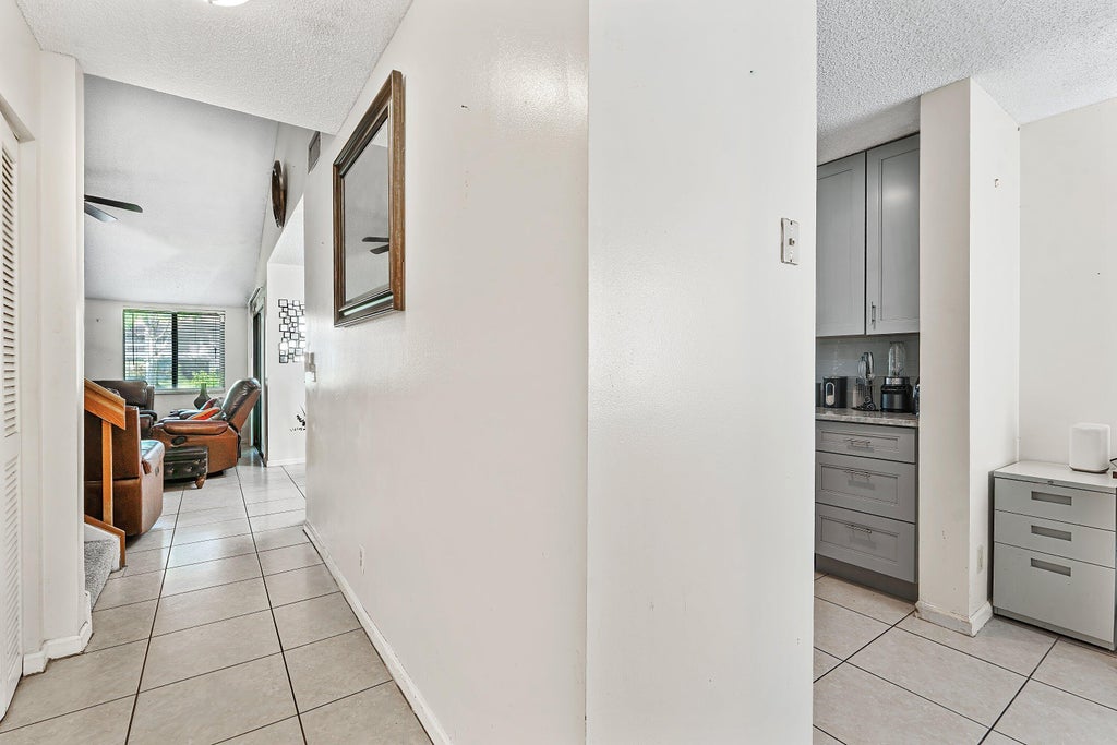 Photo of 1595 Woodbridge Lakes Circle, West Palm Beach, FL 33406 (MLS # B26080340)