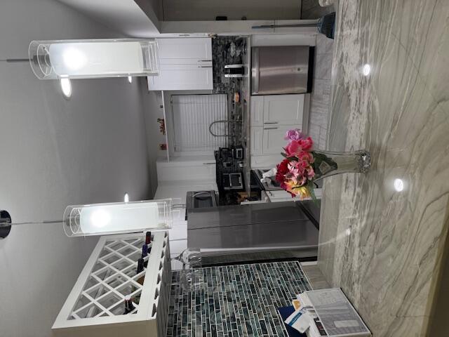 Completely renovated 2-bedroom, 2-bath condo in the heart of Boynton Beach, just minutes from I-95, shopping, and restaurants--plus only 10 minutes from the beach and vibrant Downtown Delray. This move-in-ready home features a brand-new kitchen with granite countertops and tall cabinets, updated bathrooms with sleek finishes, stylish tile flooring throughout, and a spacious walk-in closet. Enjoy a huge private patio perfect for relaxing or entertaining, and take advantage of the community's inviting pool. A must-see property offering comfort, convenience, and modern design in a prime location