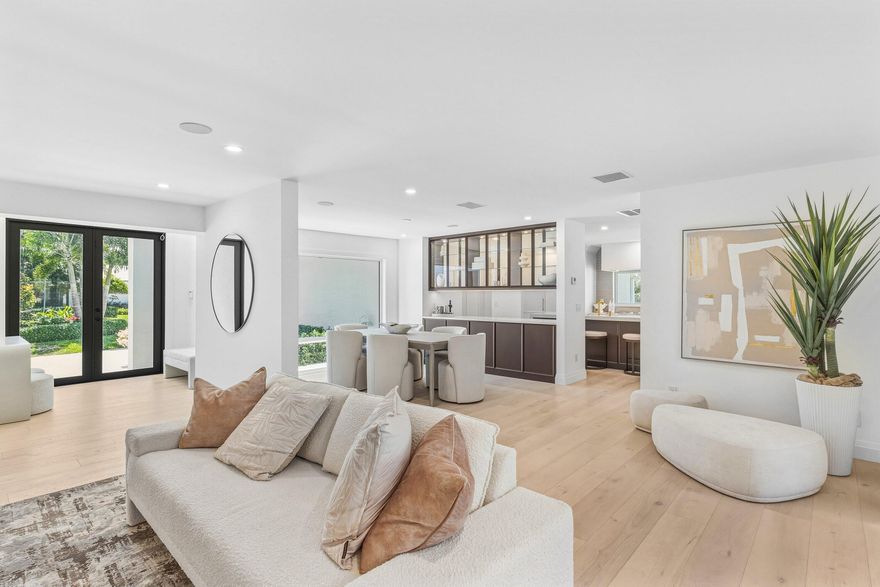 Ideally located in East Boca just minutes from the beach, this fully renovated 3-bedroom, 3-bath home offers a truly like-new living experience. Completely updated from top to bottom, the home features all brand-new finishes, creating a clean and modern feel throughout. Each bedroom includes its own private ensuite, providing comfort and privacy. The open-concept layout connects the living, dining, and kitchen areas seamlessly, while the redesigned kitchen offers sleek, contemporary finishes and functionality. With no HOA and close proximity to Mizner Park, the beach, and top dining and shopping, this is a rare opportunity to rent a fully renovated home in a prime location.