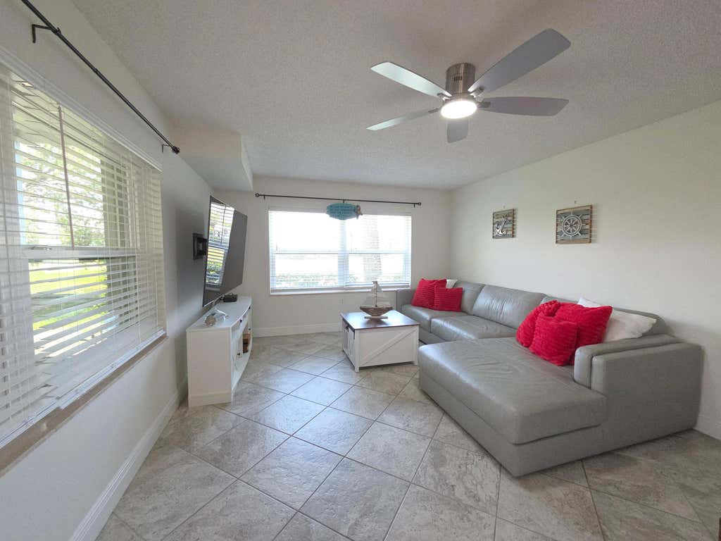 Photo of 3391 SW Sunset Trace Circle, Palm City, FL 34990 (MLS # B26040094)