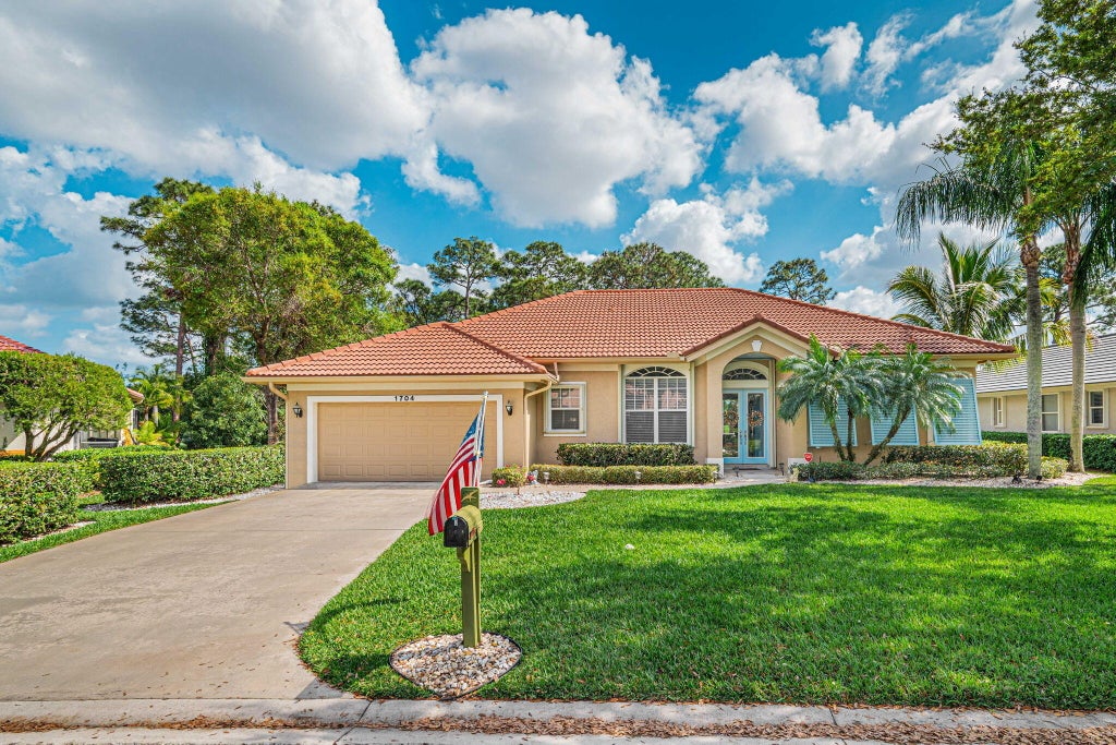 Photo of 1704 SW Mockingbird Drive, Port Saint Lucie, FL 34986 (MLS # R11062846)