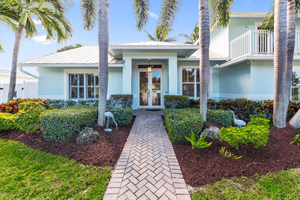 Photo of 490 Mars Way, Juno Beach, FL 33408 (MLS # B26024884)