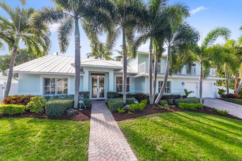 Photo of 490 Mars Way, Juno Beach, FL 33408 (MLS # B26024884)