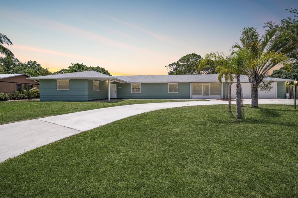 Photo of 6001 Palm Drive, Fort Pierce, FL 34982 (MLS # R11093210)