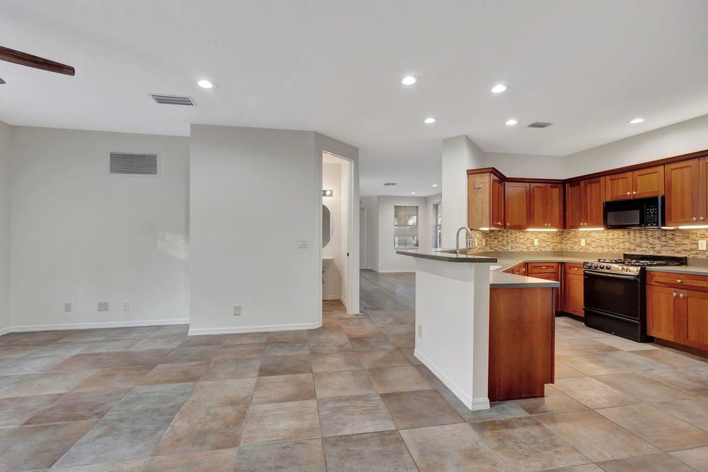 Photo of 420 Pumpkin Drive, Palm Beach Gardens, FL 33410 (MLS # R11047636)