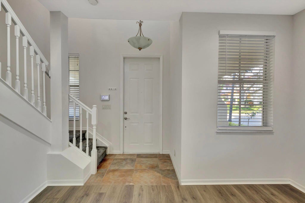 Photo of 420 Pumpkin Drive, Palm Beach Gardens, FL 33410 (MLS # R11047636)