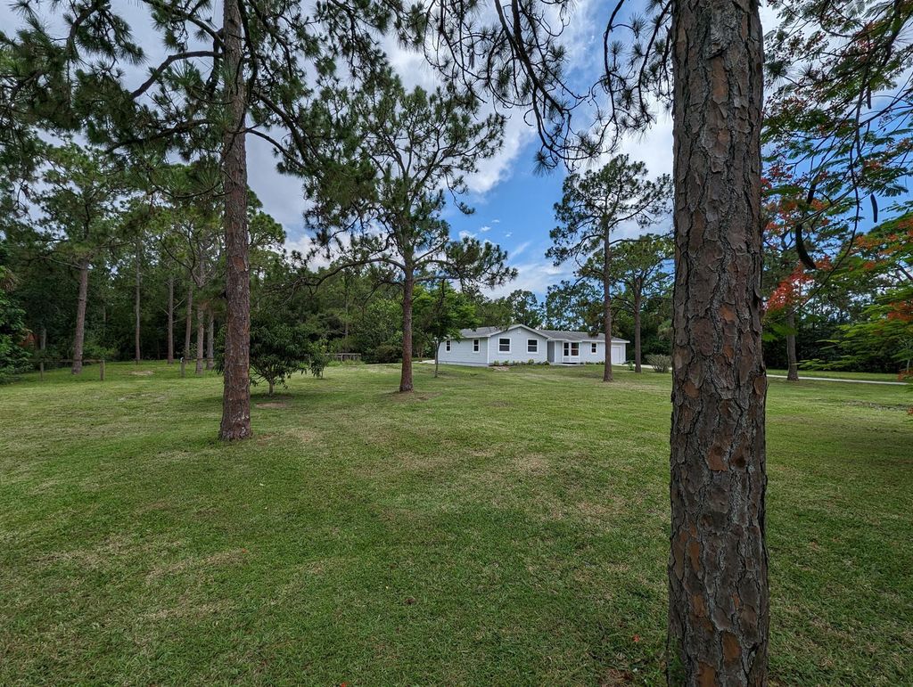 Photo of 10358 154th Road N, Jupiter, FL 33478 (MLS # R10896284)