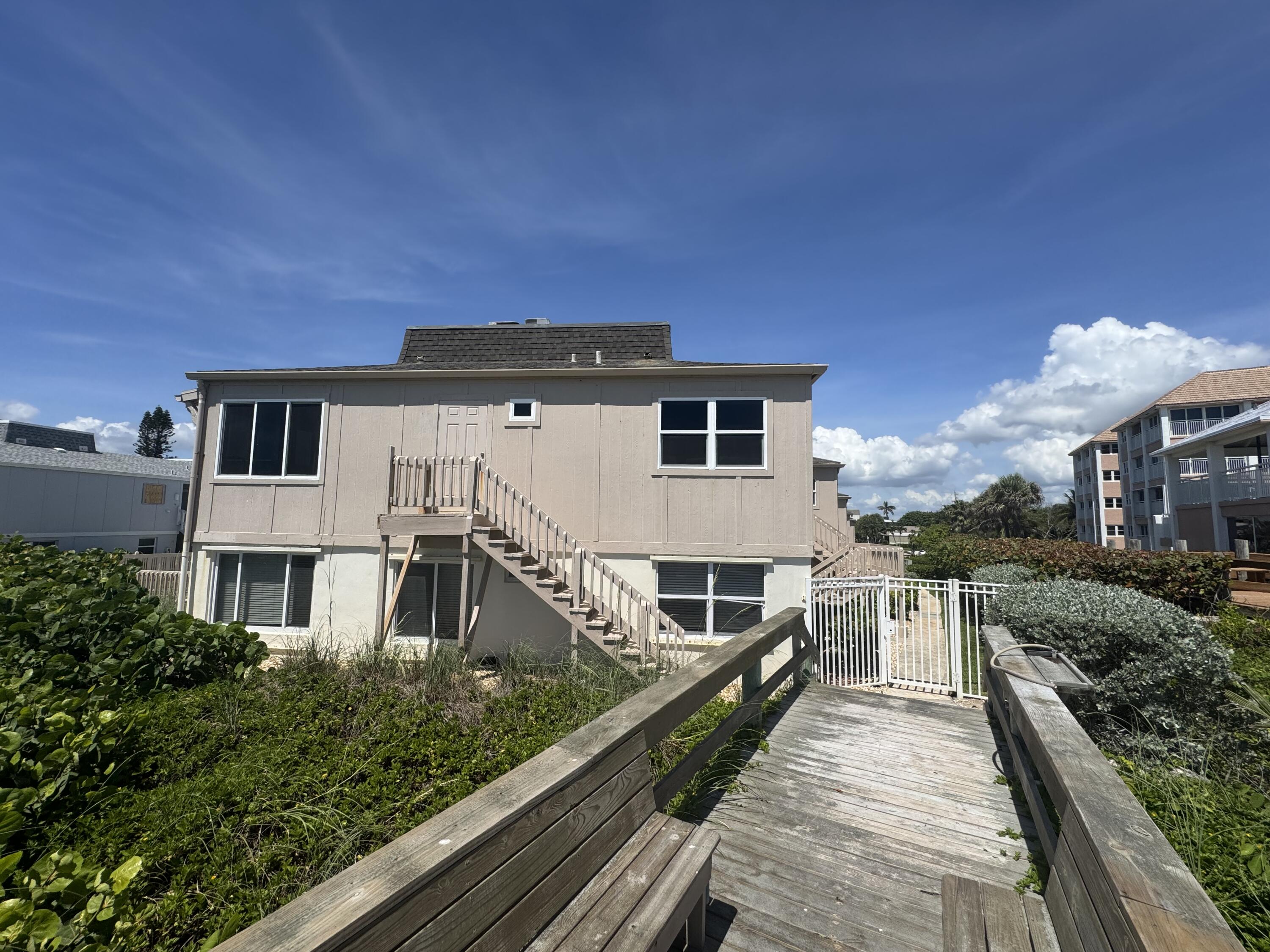 Attention Beach Lovers... This unit is a MUST SEE!! Little Ocean Place is an oceanside complex of only 14 units with private access to the beautiful sandy beach and a great community pool! Enjoy the Ocean breezes, the sound of the waves and beautiful sunrises on the beach, or from the observation deck. This 2 Bedroom, 1.5 bath, first floor condo has a large, light and bright Living area, Dining Area and Kitchen. It also has a full-size washer & dryer in the unit! You're close to several dining options, the Oceanographic Institute, The Elliott Museum, shopping and so much more! Historic downtown Stuart and downtown Jensen Beach are just a short drive away. Available for $4000/mo. in season, or $2,500/mo. during off season. Book this one before it disappears!