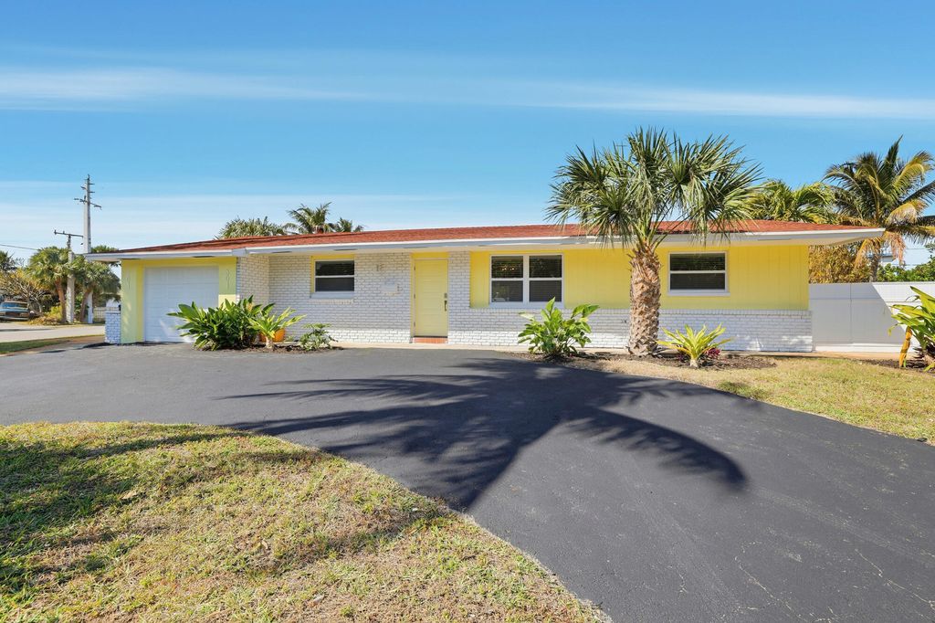 Photo of 301 Wilma Circle, Riviera Beach, FL 33404 (MLS # R11164006)