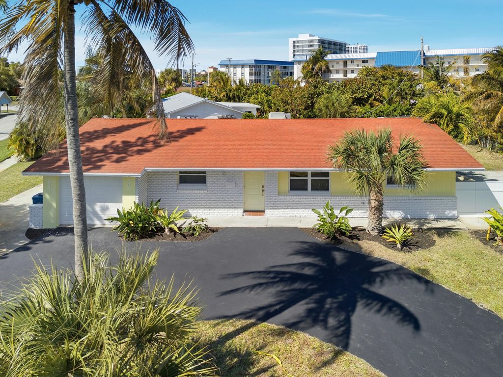 Photo of 301 Wilma Circle, Riviera Beach, FL 33404 (MLS # R11164006)