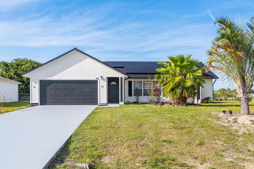 LOCATION, LIFESTYLE & VALUE ! Beautiful updated 3 bed, 2 bath pool home on a pie-shaped corner lot with peaceful canal views. Located in desirable South of Port St Lucie, with quick access to I95 & Turnpike, perfect for commuters!
New Pool Pump| 2022 A/C & Water Heater| Updated Bathrooms| Split Floor Plan| Screened Pool Enclosure| Porcelain Tile throughout| Freshly painted|Energy-efficient| Not only is this home stylish and functional, but it's also Eco-Friendly thanks to its Solar Panels. You can enjoy lower energy and do your part for your environment at the same time. MOVE IN READY! Don't wait homes like this go fast. Schedule your showing today!