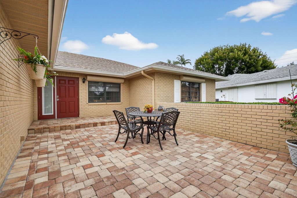 Photo of 10659 Greentrail Drive S, Boynton Beach, FL 33436 (MLS # R11160856)
