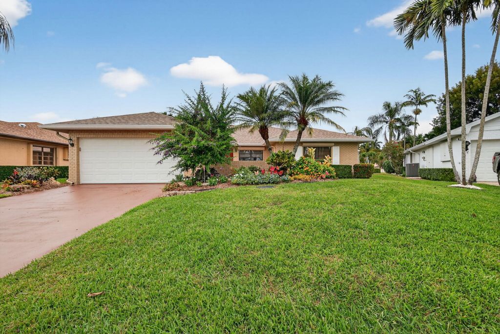 Photo of 10659 Greentrail Drive S, Boynton Beach, FL 33436 (MLS # R11160856)