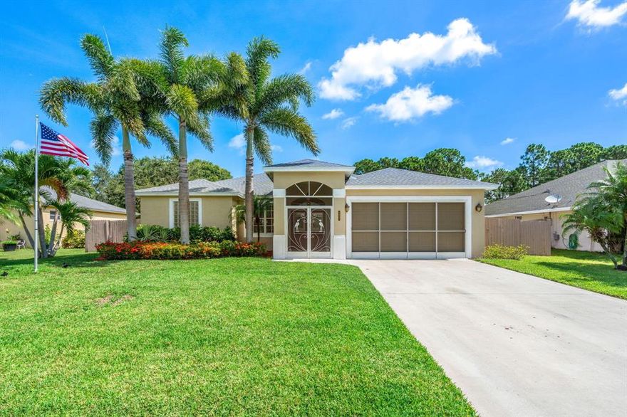 Welcome to this gorgeous 3 bed, 2 bath, pool home with a fully fenced in yard. NEW ROOF, NEW AC, NEW INTERIOR AND EXTERIOR PAINT, ALL TILE FLOORING. This turn-key home features a gourmet kitchen with granite counter tops and stainless steel appliances. The spacious primary suite has dual vanities, a soaking tub, shower, and a large walk-in closet. This meticulously maintained home has a private backyard with a pool and screened in porch perfect for hosting friends and family. Experience luxury living in this beautiful home located close to shopping, dining, and I-95. Schedule your showing today and make 1221 SW Emerald Ave your forever oasis in Port St. Lucie!
