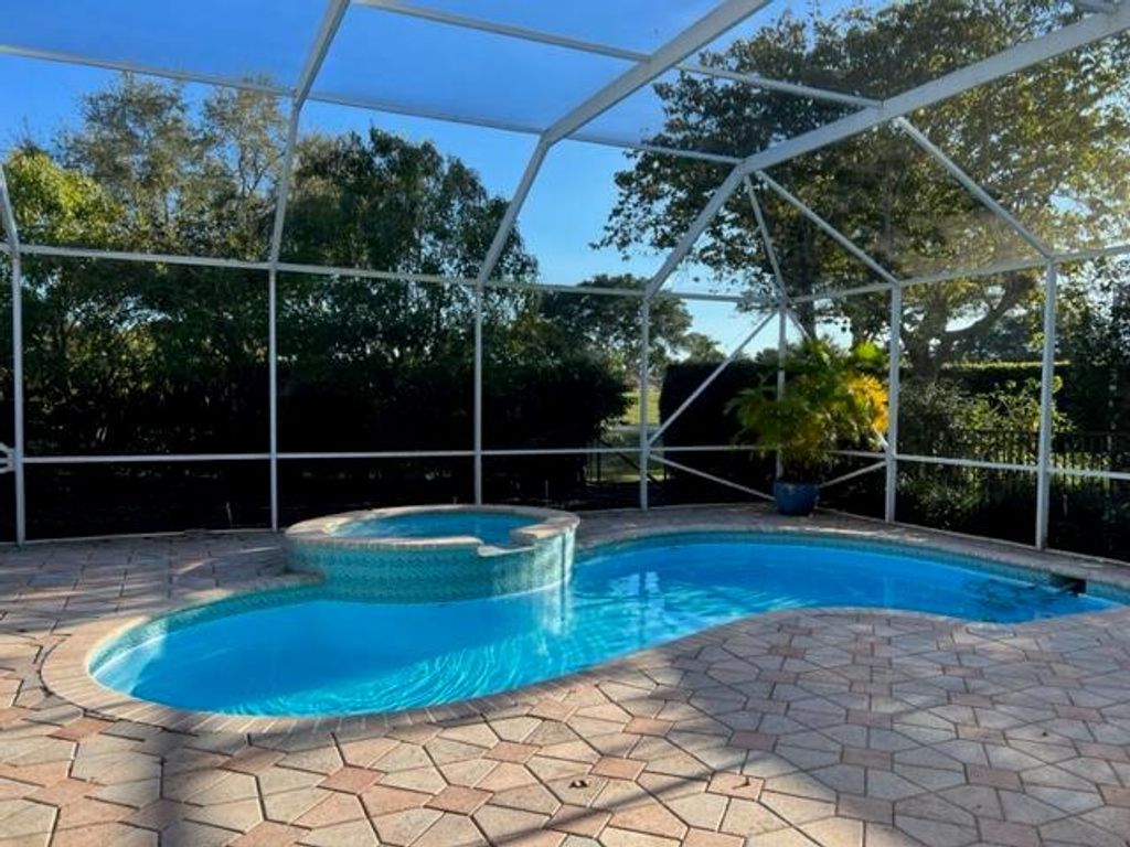 Photo of 104 Isle Drive, Palm Beach Gardens, FL 33418 (MLS # R10860415)