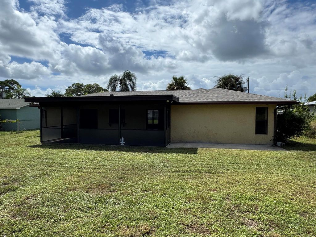 Photo of 1061 SE Lansdowne Avenue, Port Saint Lucie, FL 34983 (MLS # R11024058)