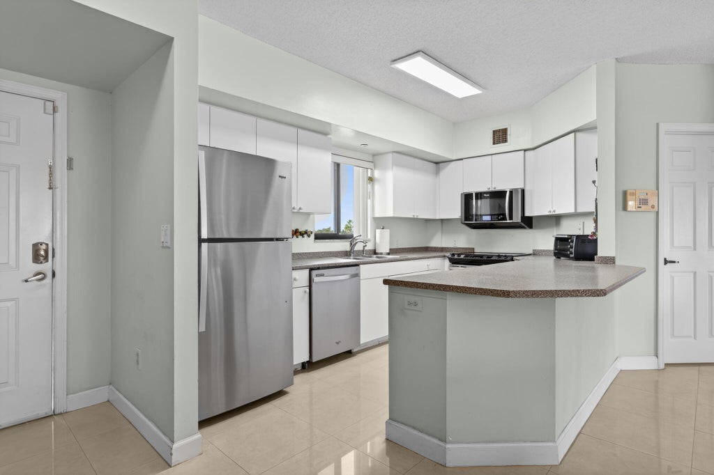 Photo of 2015 Lavers Circle #403, Delray Beach, FL 33444 (MLS # B26059195)