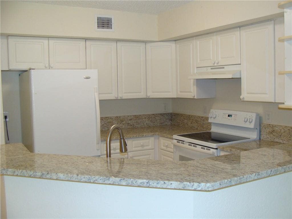 Photo of 4245 S 57TH Avenue #104W, Greenacres, FL 33463 (MLS # B26065233)