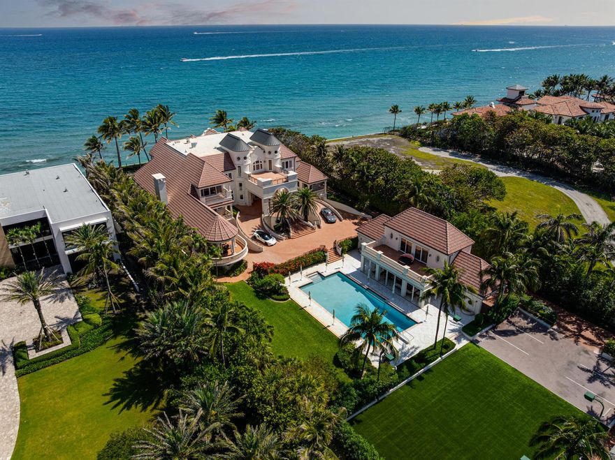 Commanding 151+/- feet of direct ocean frontage, Villa Rebecca is a rare ocean-to-Intracoastal estate that epitomizes timeless European elegance. Set on 1.33+/- acres of manicured grounds in the enclave of Manalapan, this Italian-inspired residence was designed by renowned architect Shane Ames.Spanning more than 30,000 total square feet, with nearly 16,000 square feet of living space, the gated compound offers 9 bedrooms, 13 full and 4 half baths, and a separate 2-bedroom guest house.A dramatic three-story foyer with a sweeping marble staircase and a 35-foot chandelier sets a regal tone, leading to grand living and dining rooms accented by Venetian plaster ceilings, intricate millwork, and imported hand-carved marble floors. The chef's kitchen features double Sub-Zeros, a Wolf gas