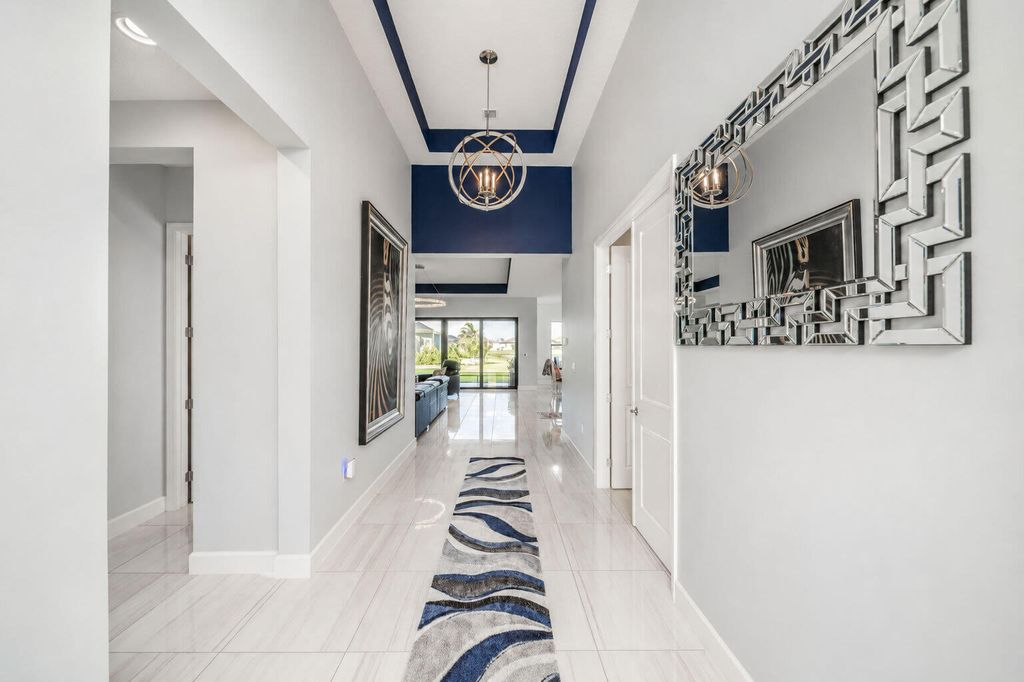 Photo of 12435 SW Pink Playa Parkway, Port Saint Lucie, FL 34987 (MLS # B26040653)