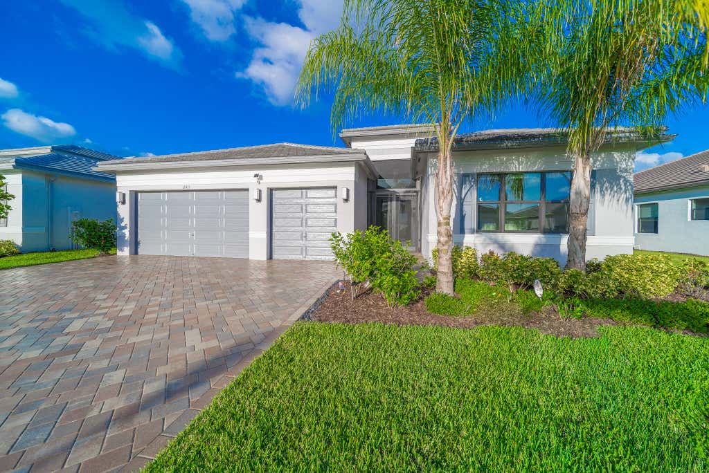 Photo of 12435 SW Pink Playa Parkway, Port Saint Lucie, FL 34987 (MLS # B26040653)