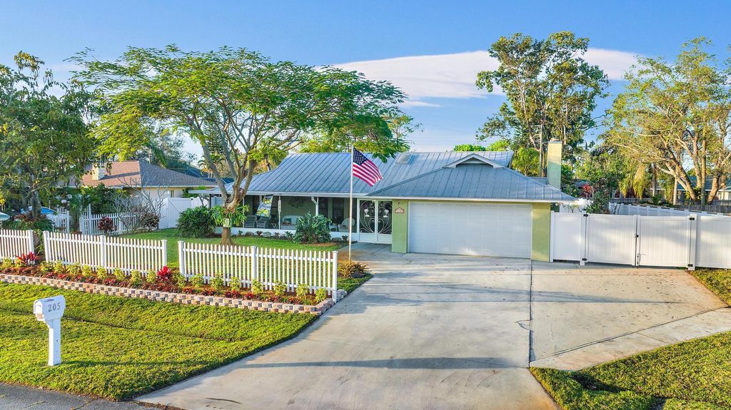 Photo of 205 SW Inwood Avenue, Port Saint Lucie, FL 34984 (MLS # R10962789)