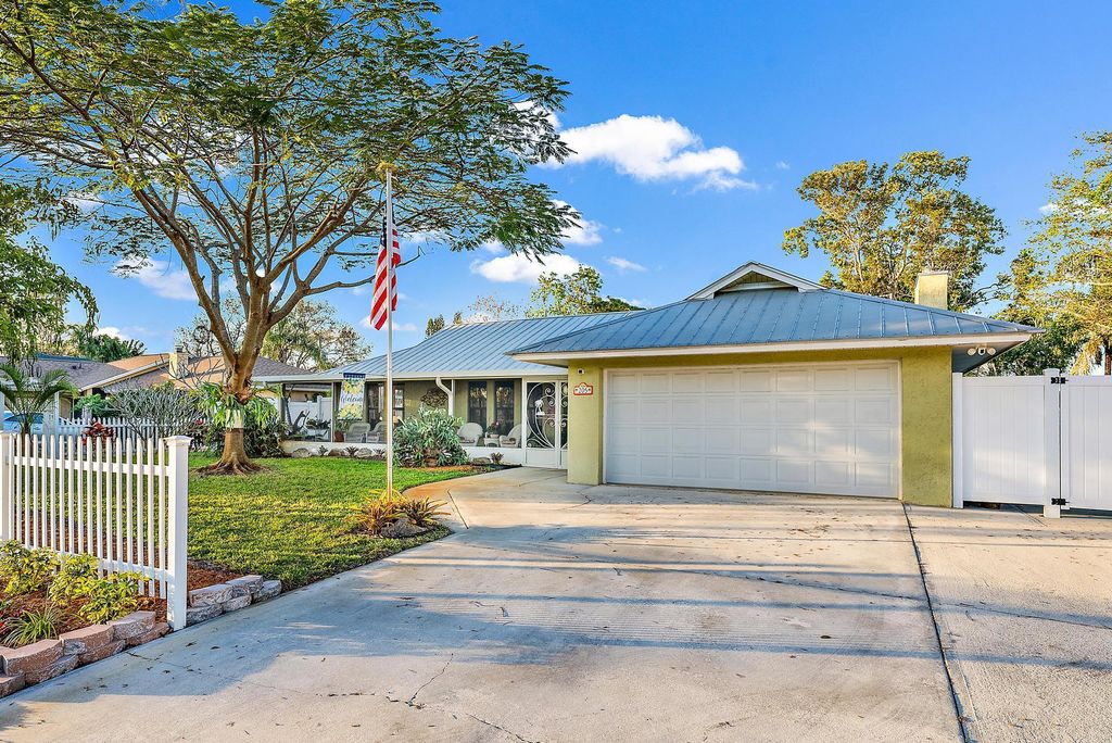 Photo of 205 SW Inwood Avenue, Port Saint Lucie, FL 34984 (MLS # R10962789)