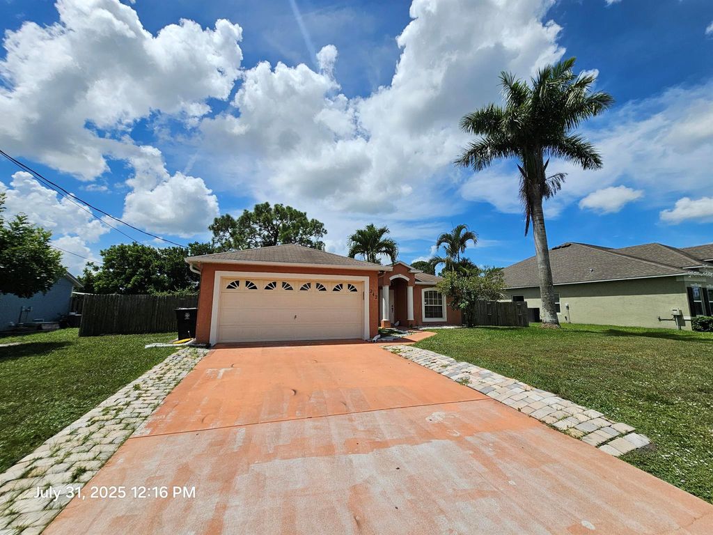 Photo of 242 SW Janice Avenue, Port Saint Lucie, FL 34953 (MLS # R11112995)