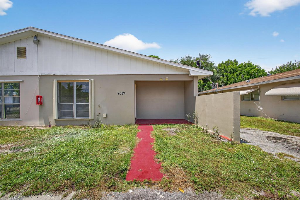Photo of 2089 E Bond Dr, West Palm Beach, FL 33415 (MLS # R11119139)